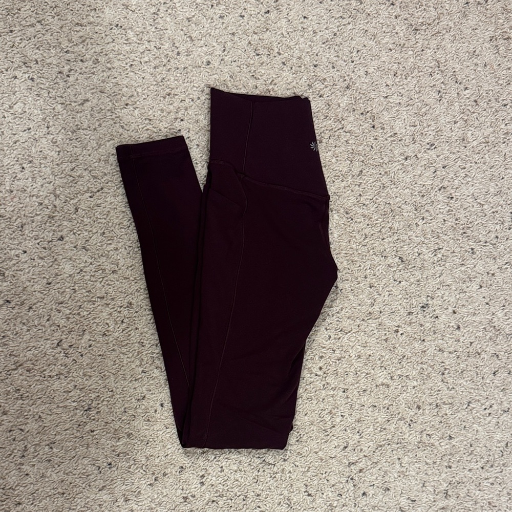 Athleta salutation stash tight